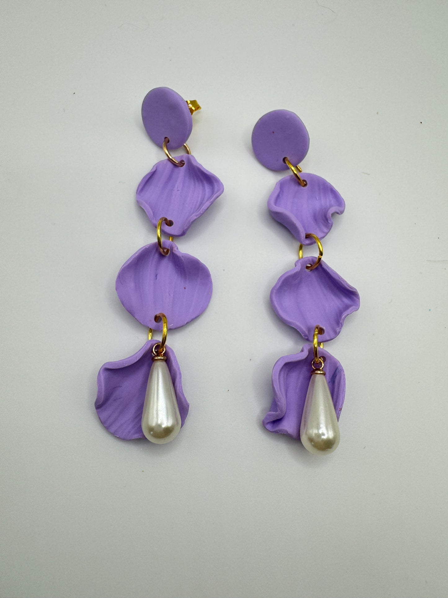 Brincos compridos roxo